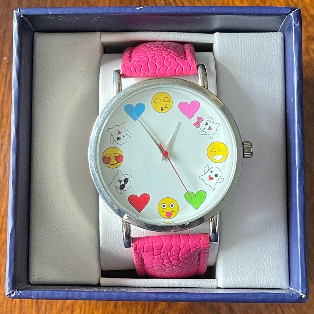 This is a child size watch. Never taken out of box. Pink leather band.
